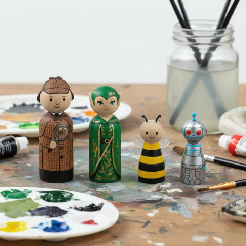 Hand-painted two-part turned wooden peg dolls as characters