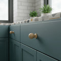 33 mm ümar ash puidust mööblinupp installed on cabinet door