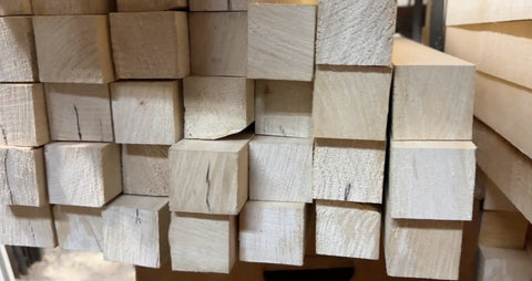 Stack of woodturning blanks ready for turning
